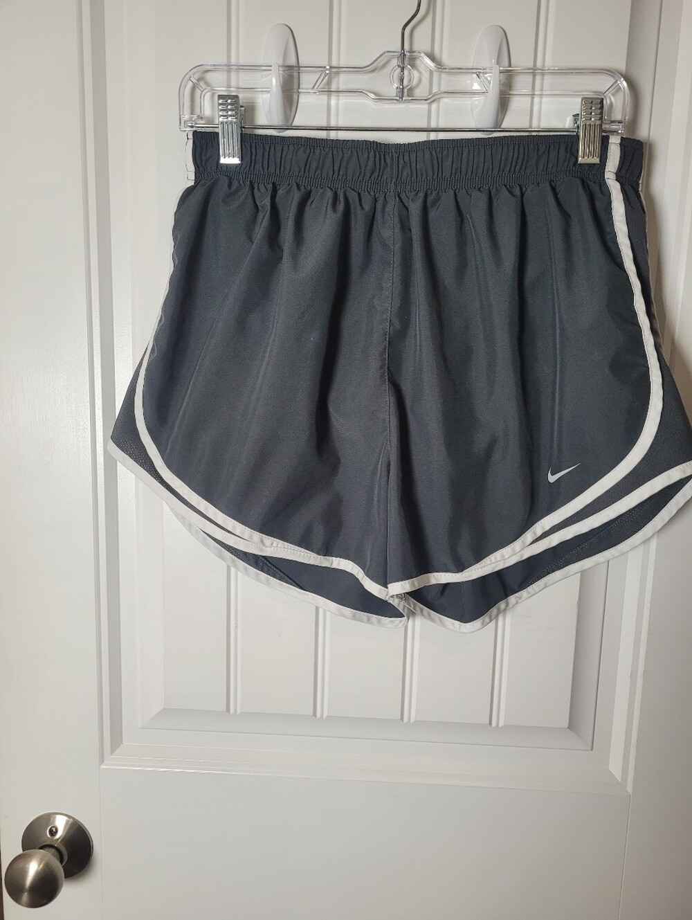Nike Women's Black Athletic Shorts with White Trim. Size L